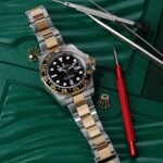 Rolex GMT Master II 40mm Steel and Yellow Gold