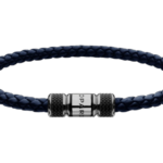 Blue braided leather bracelet with a silver cylindrical clasp centered on a black background, close-up view.