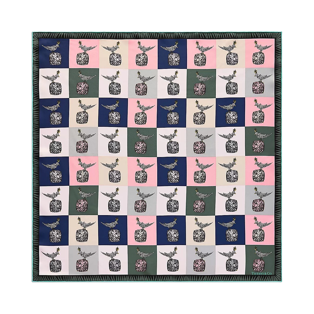 Quilt-like textile with a repeating vase-and-bird motif on pastel squares in pink, blue, and green bordered by a teal edge.