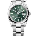 Rolex Oyster Perpetual Datejust wristwatch with a green dial, silver markers, and a date window at 3 o'clock on a stainless steel bracelet.