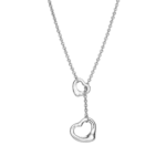 Silver chain necklace with a heart‑shaped pendant and a dangling smaller heart charm against a black background (y‑shape design).