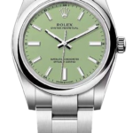 Rolex Oyster Perpetual stainless steel wristwatch with a light green dial and silver hour markers.