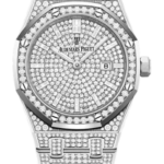 Diamond-encrusted Audemars Piguet wristwatch with a pavé dial, diamond-studded bracelet, and date window on a black background