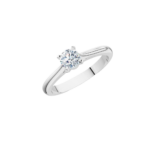 Solitaire diamond ring in a white metal band with prong setting on a black background, showing a single round-cut diamond.