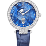Blue dial Harry Winston watch with a diamond-encrusted bezel, moon phase display, and blue leather strap