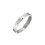 Silver Cartier Love bracelet with visible screw motifs on a black background, angled to show curvature.