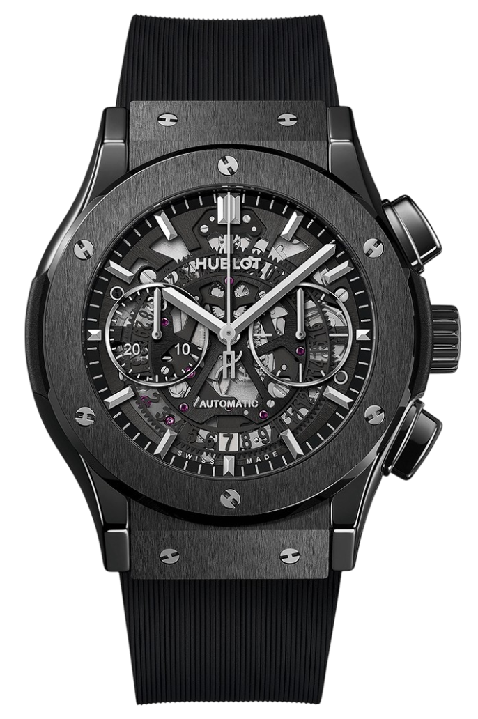 Hublot skeleton chronograph watch with a black brushed case, visible gears, and a rubber strap