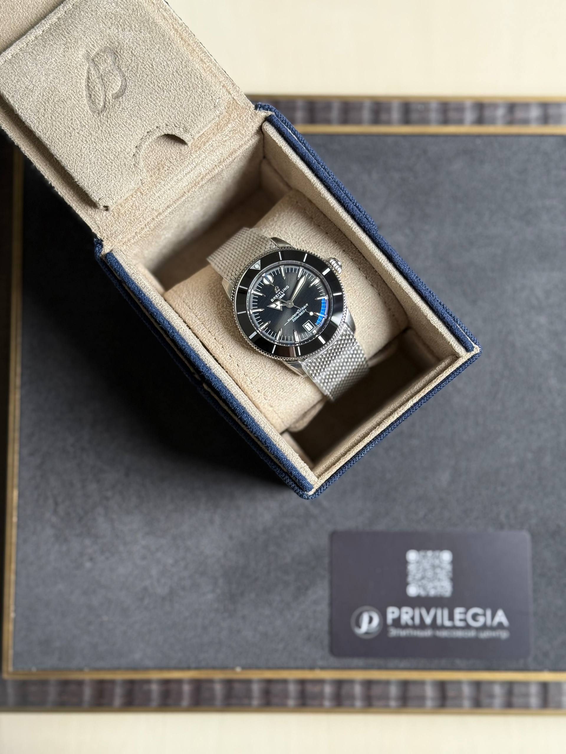 Breitling wristwatch with a black dial in a beige suede presentation box with blue lining
