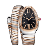 Bulgari women's luxury watch with black dial, diamond-encrusted rose-gold bezel, and a two-tone coiled bracelet.