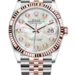 Rolex Oyster Perpetual Datejust watch with a two-tone rose gold and steel bracelet, fluted bezel, and diamond hour markers on a mother-of-pearl dial.