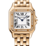Gold Cartier wristwatch with a diamond-studded bezel and white Roman numeral dial.