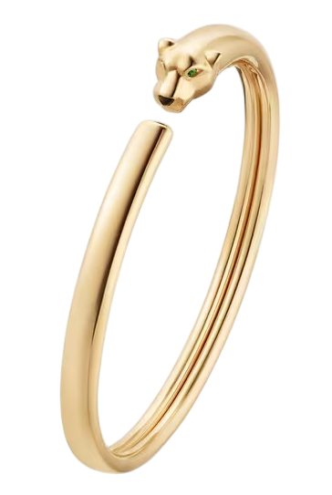 Gold open cuff bracelet featuring a cat head detail at the end