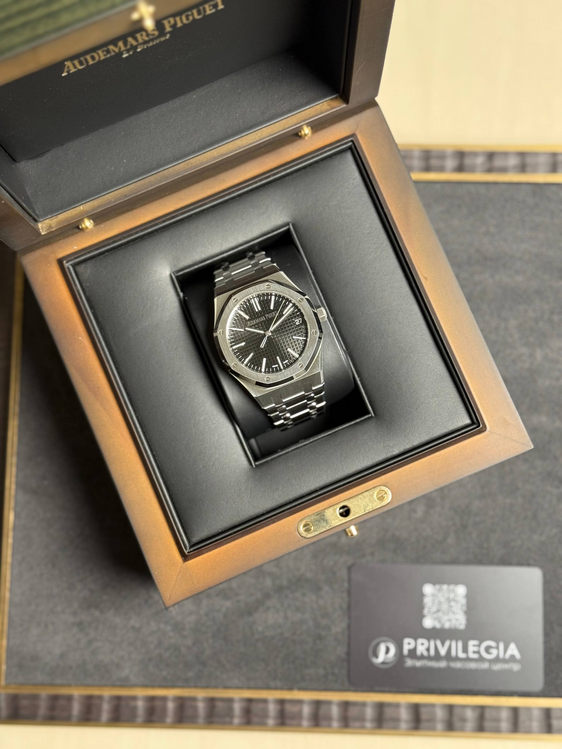 Luxury stainless steel Audemars Piguet Royal Oak wristwatch in an open presentation box