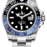 Rolex GMT‑Master II with black dial, blue and black bezel, and stainless steel bracelet showing the date at 3 o'clock with magnifier.