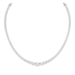 Diamond tennis bracelet with pavé-set diamonds along a curved metal band and secure clasp ends