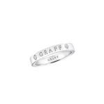 Close-up of a white-gold ring with diamonds set along the band and 'GRAFF' engraving visible across the metal.