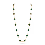Gold chain necklace adorned with evenly spaced green four-leaf clover charms.